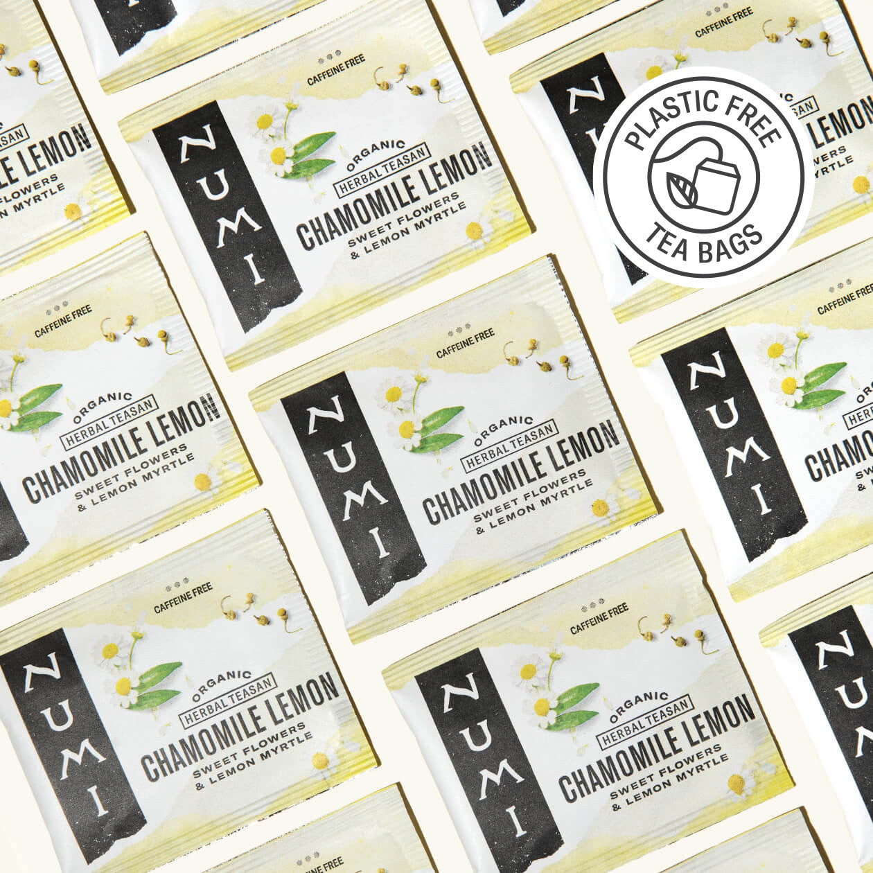 Multiple Numi Chamomile Lemon tea bags on a white background