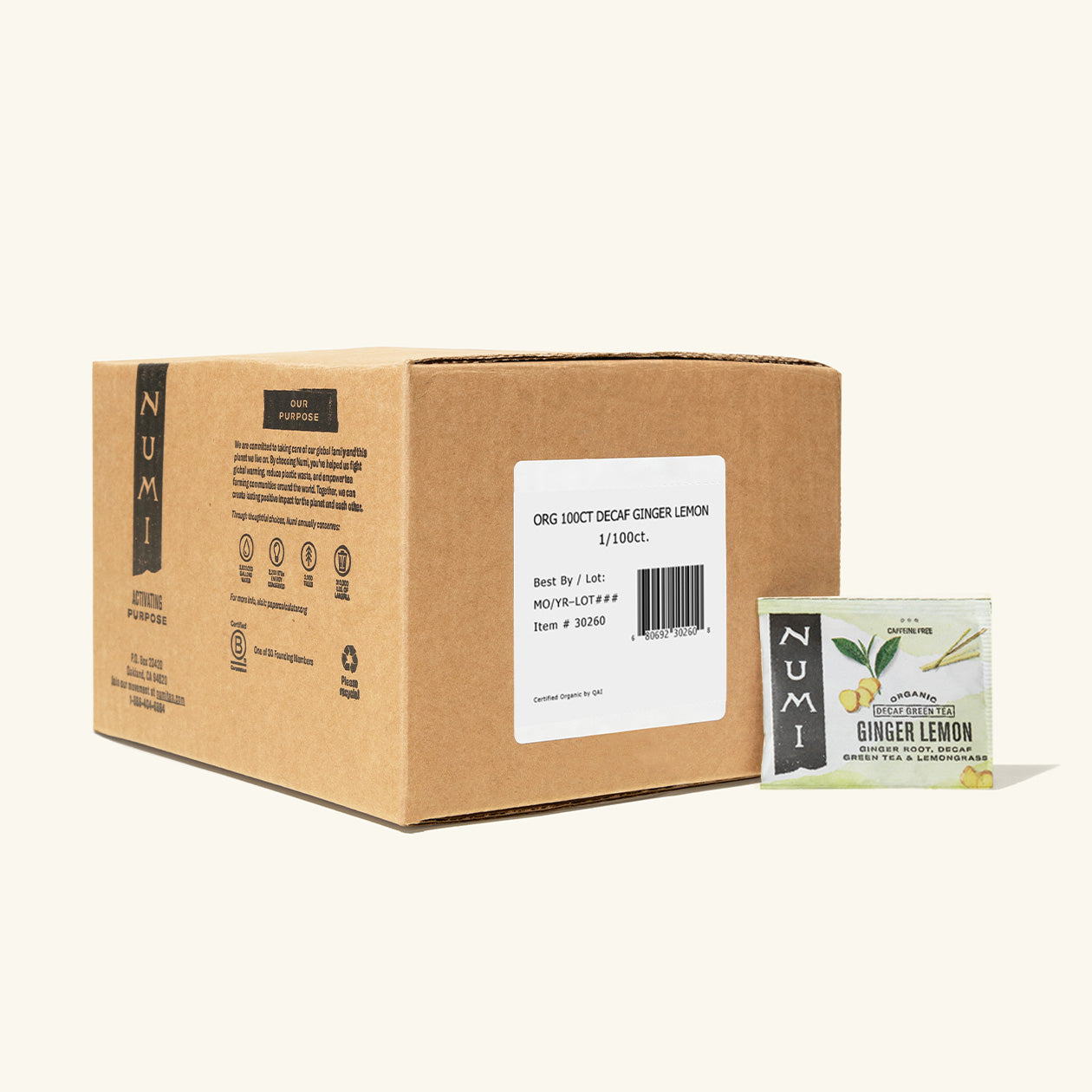 Numi tea box and single package on a white background