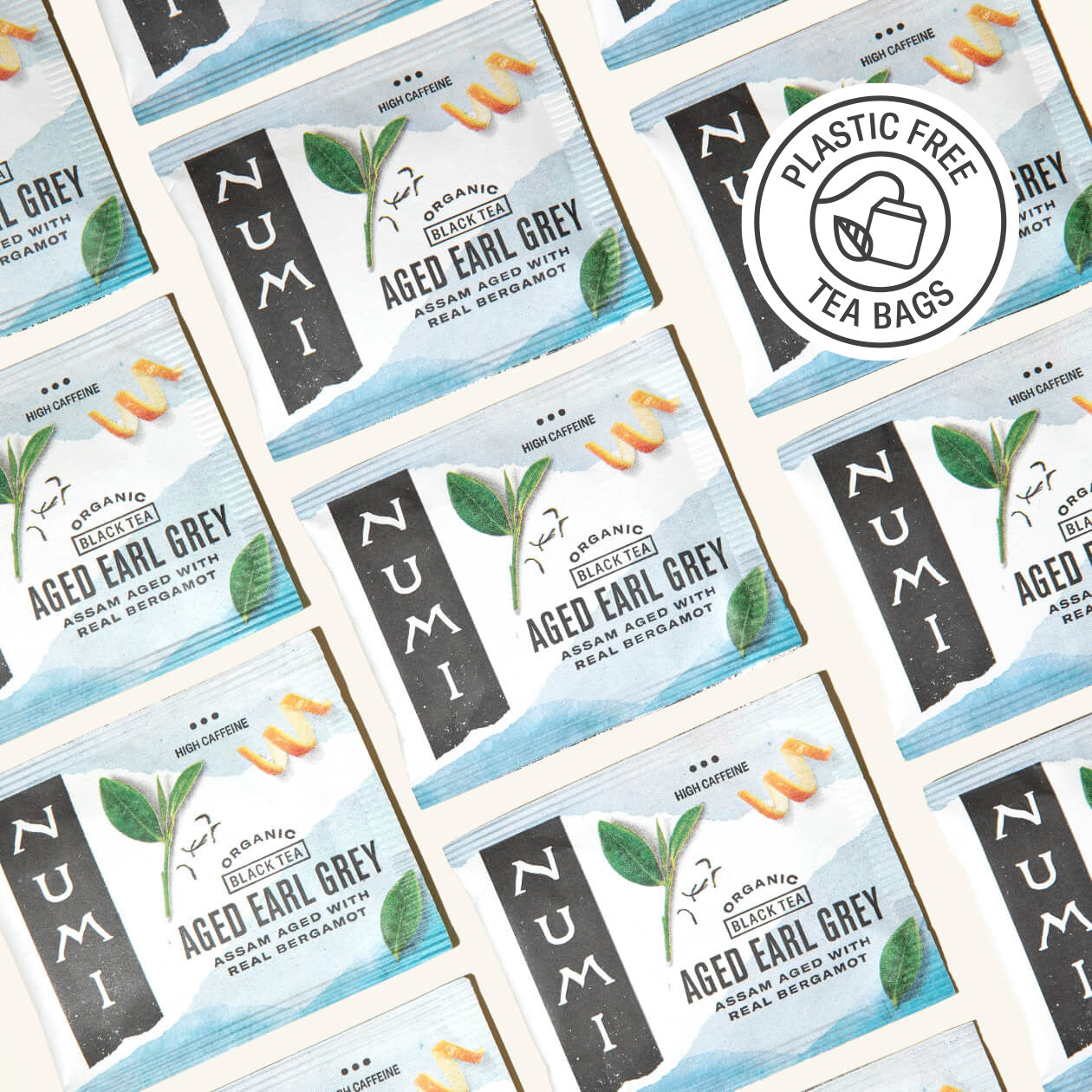 Numi Aged Earl Grey tea bags with a plastic-free logo on a white background