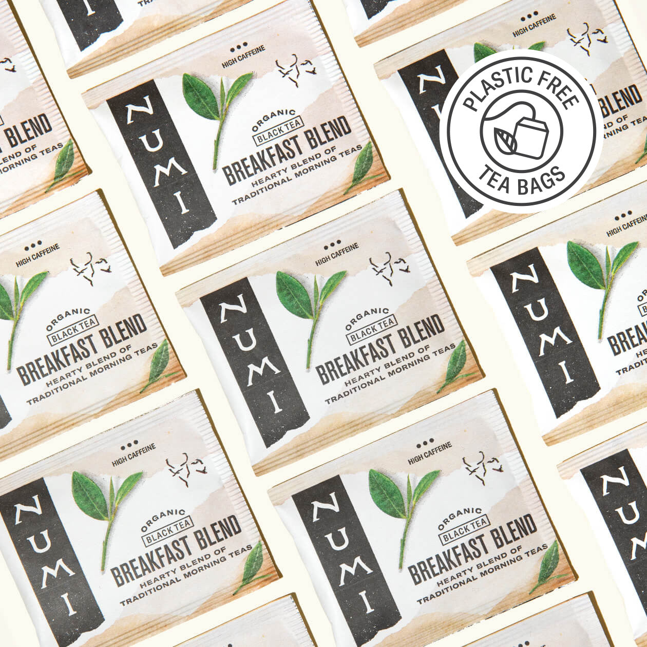 Pattern of Numi Organic Tea Breakfast Blend tea bags with visible branding.