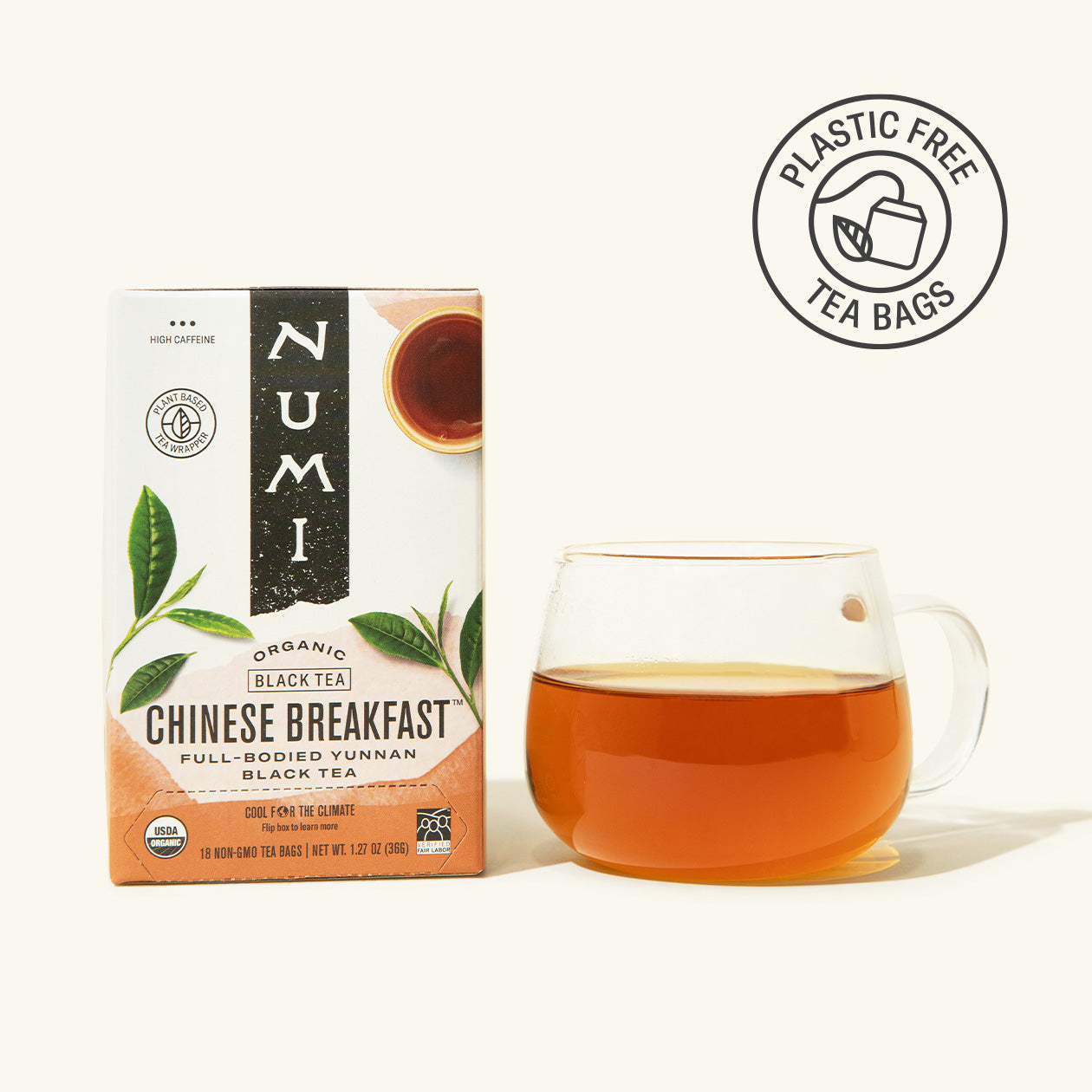 Numi Chinese Breakfast black tea box with a cup of tea on a white background