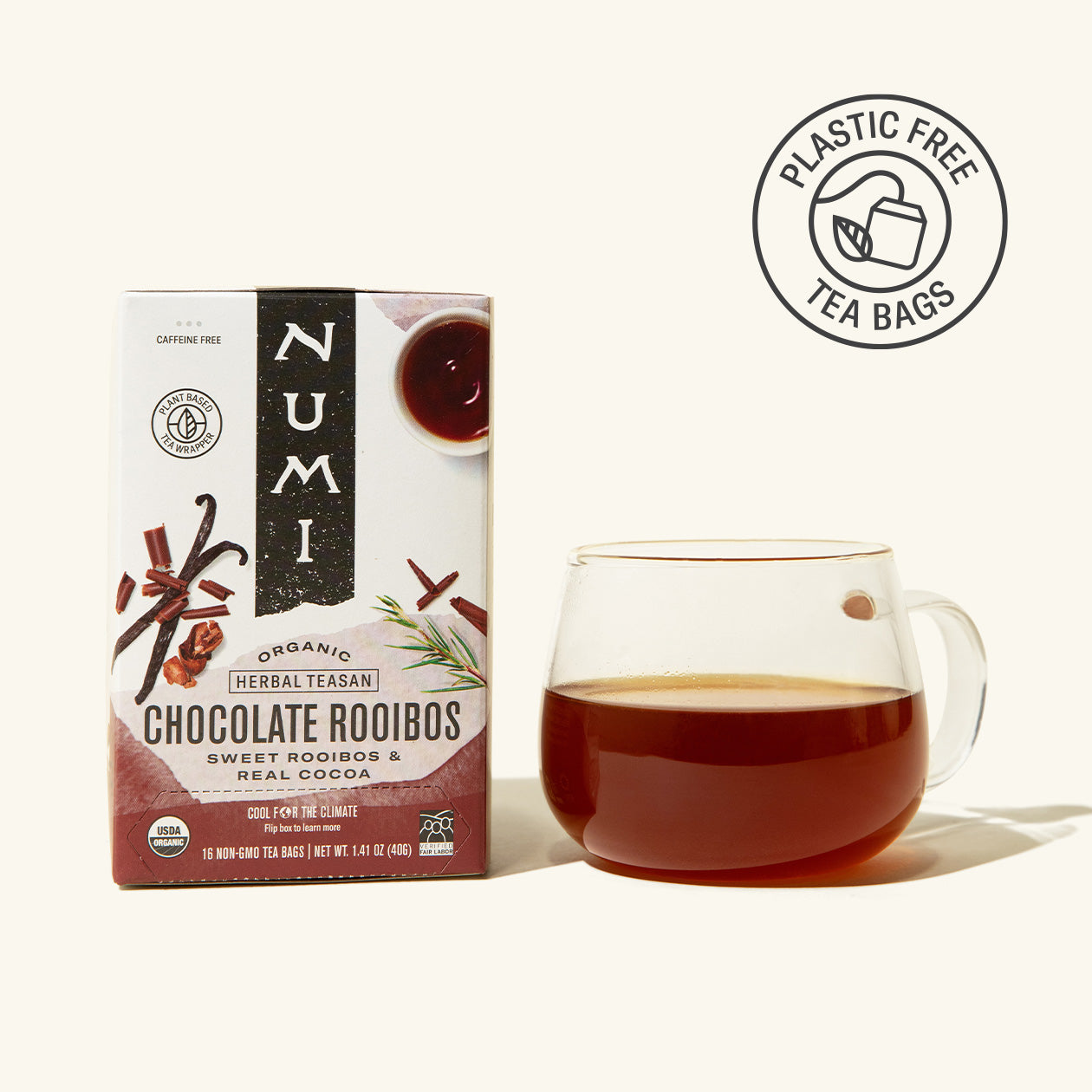 Numi Chocolate Rooibos tea box with a glass of tea on a white background