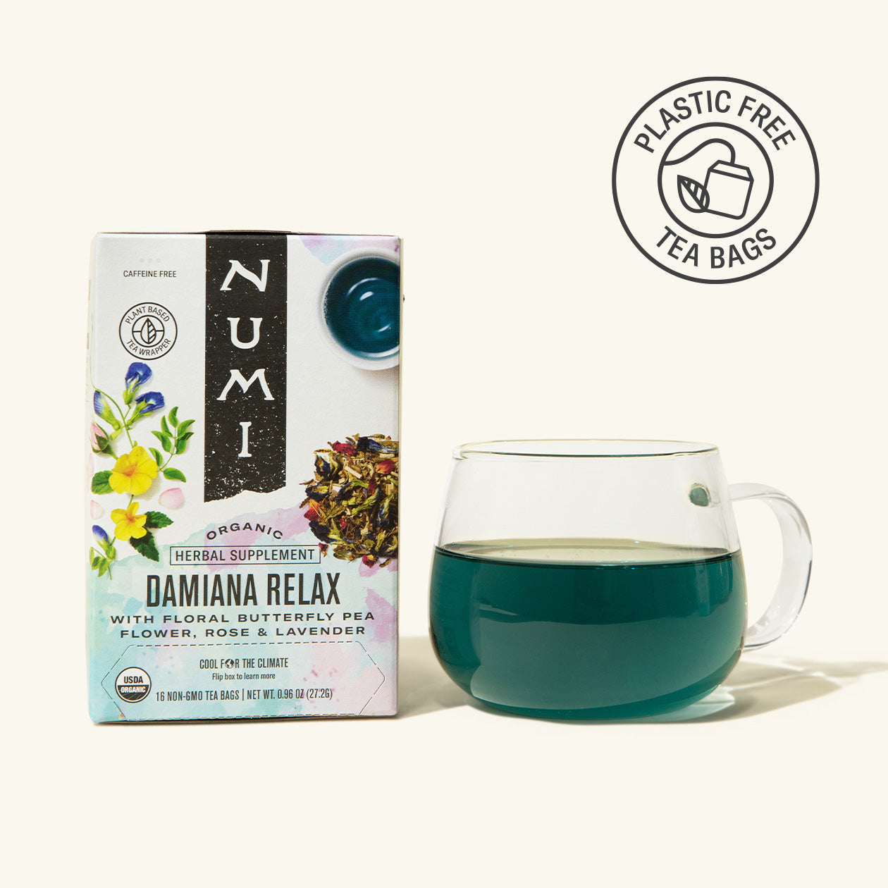 Numi Damaiana Relax tea box with a glass of green tea on a white background