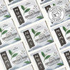 Numi Emperor's Pu-erh tea packages arranged in a pattern.