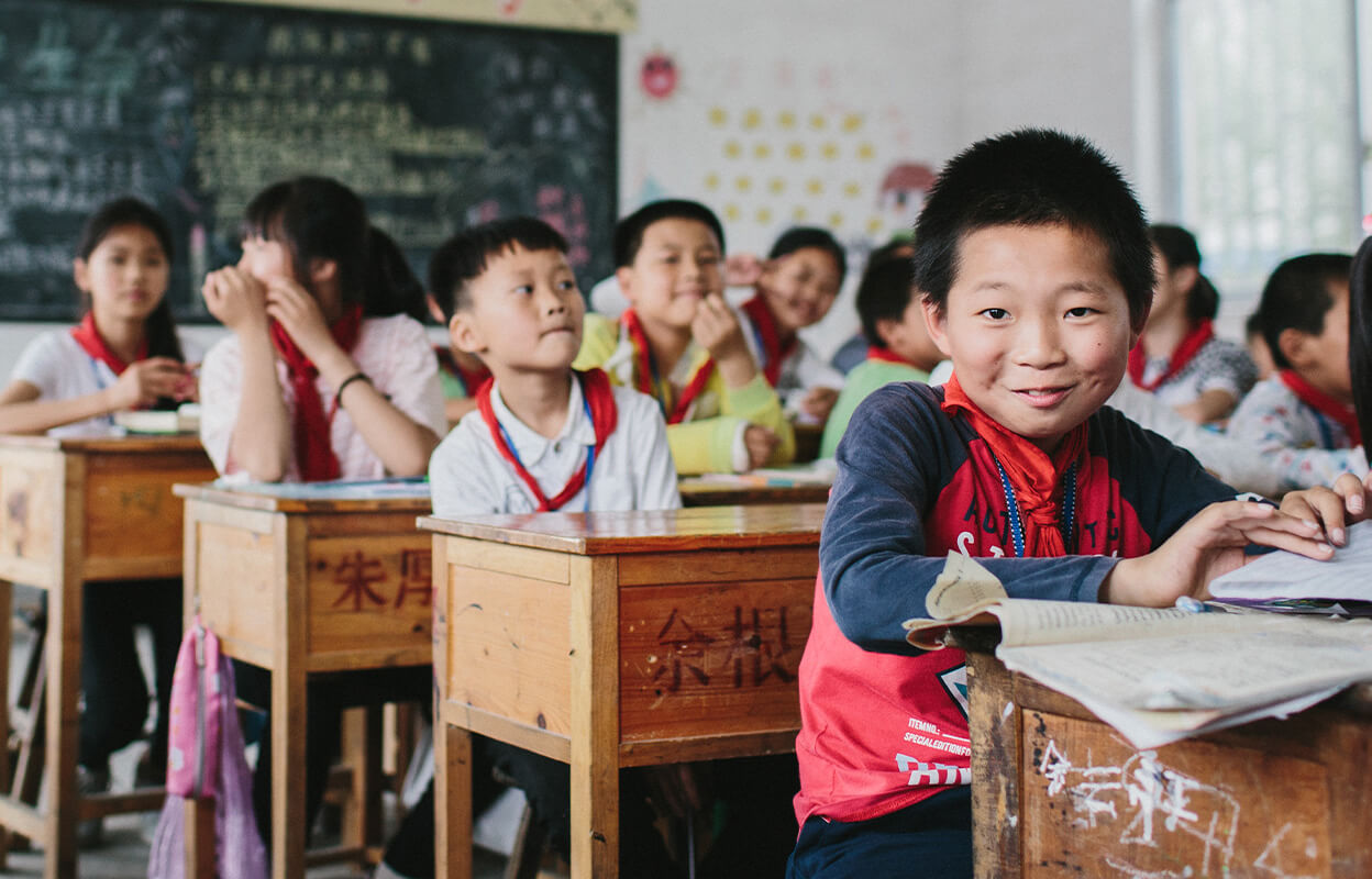Chinese students in the classroom that benefitted from Numi's Fair Trade premiums
