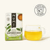 Numi Gunpowder Green tea box with a glass of tea on a white background