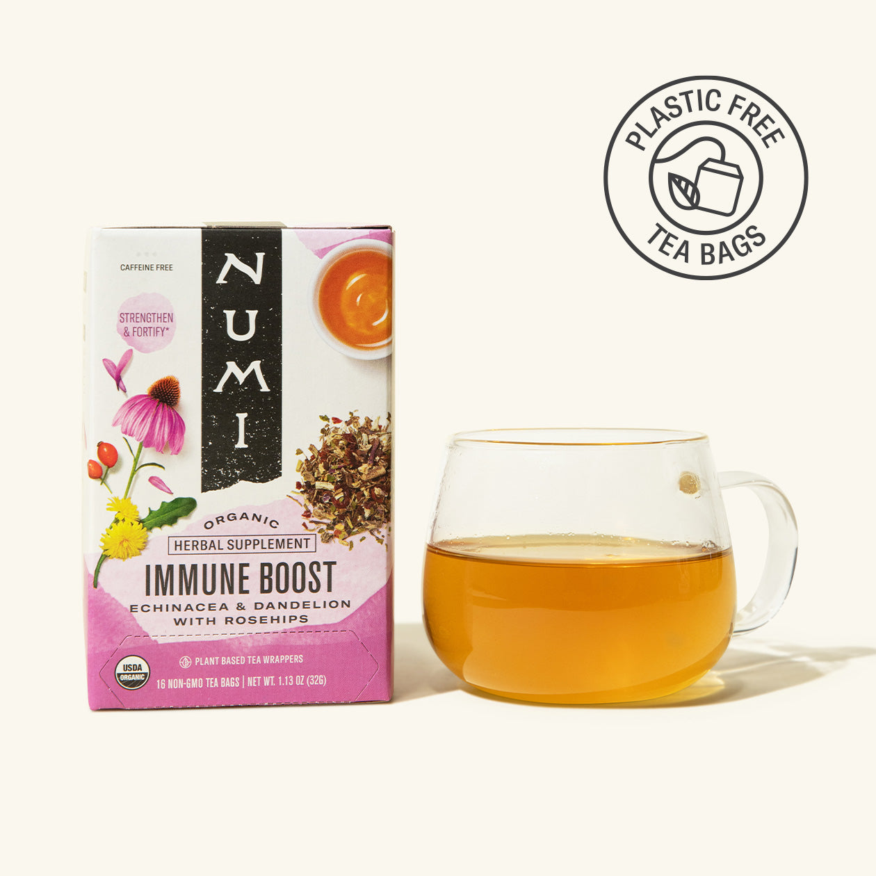 Numi Organic Immune Boost tea box with a glass of tea on a white background