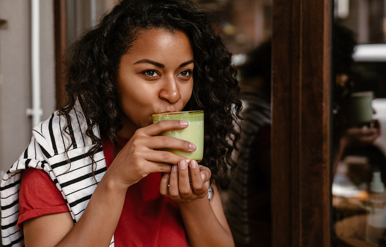 matcha-latte-woman-drinking-hot-drink.jpg