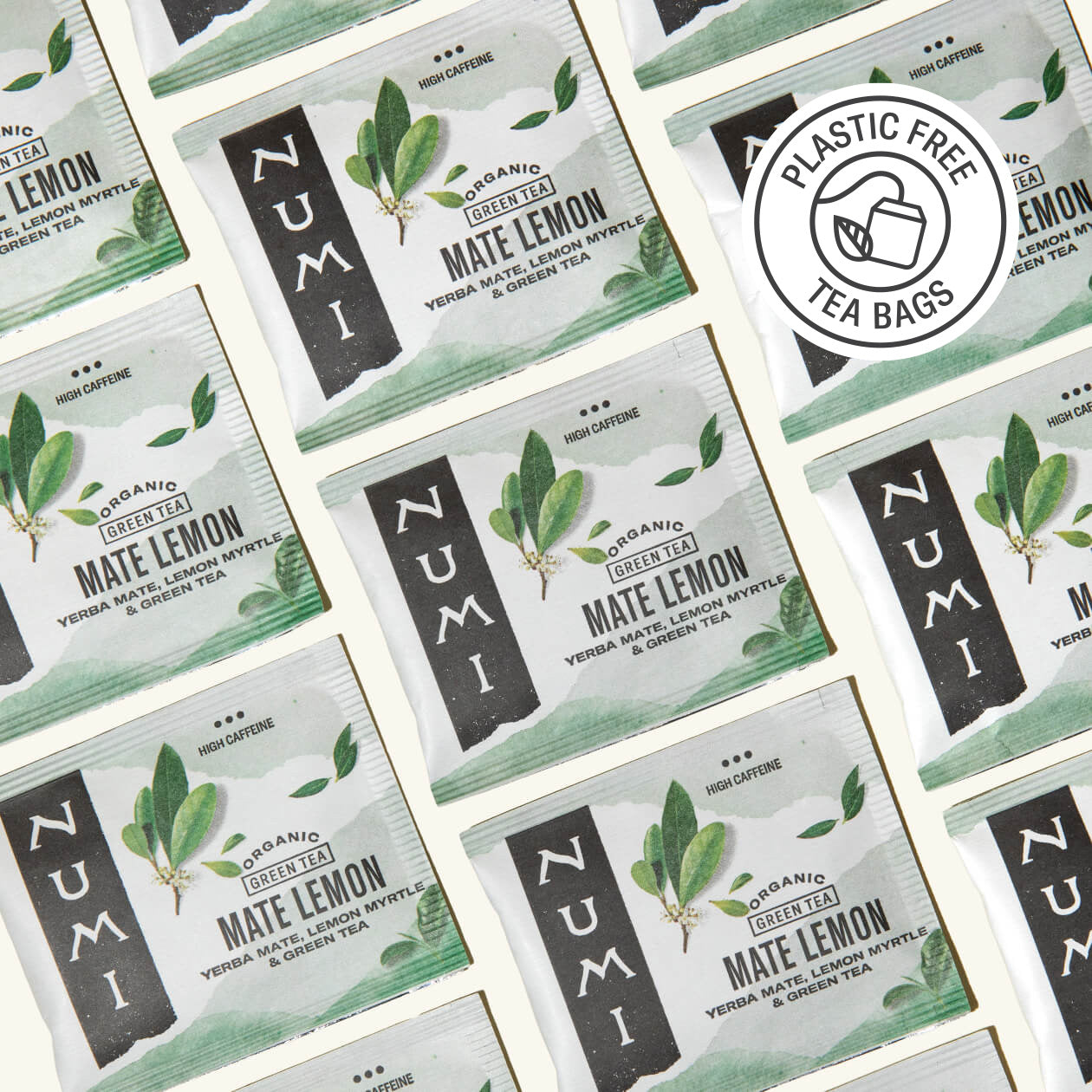 Numerous Numi Organic Tea Mate Lemon tea bags arranged in a pattern.