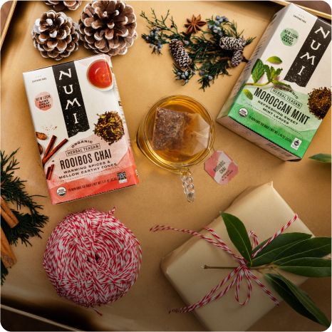 Numi holiday flavor teas in a decorative setting