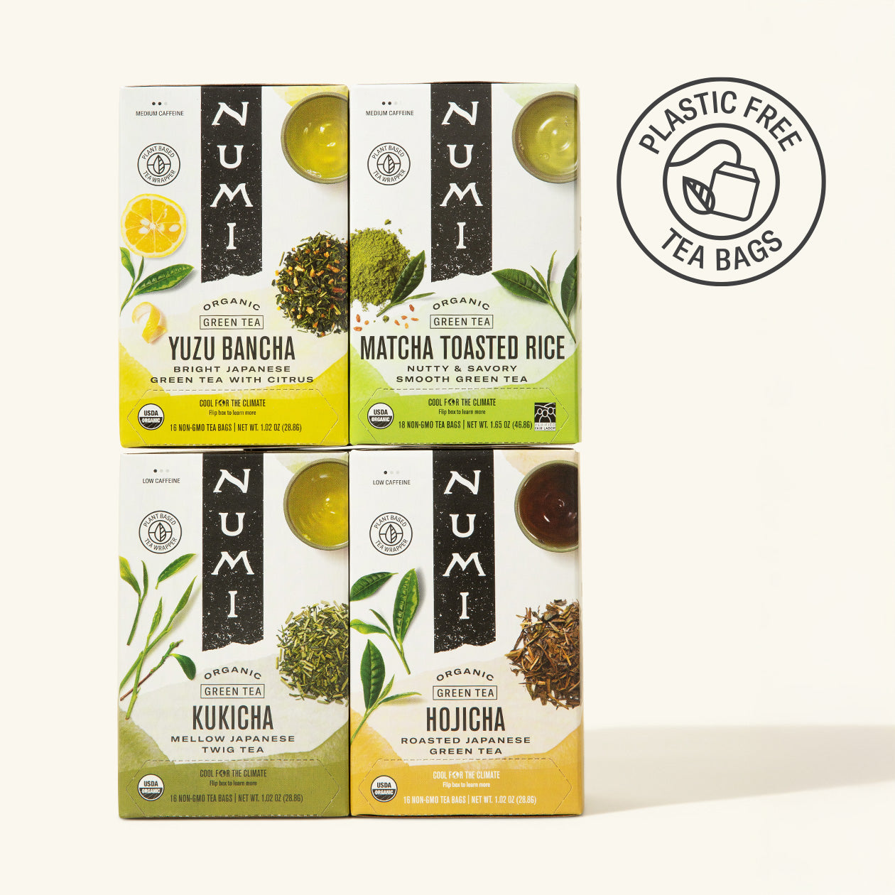Four Numi tea boxes with different green tea varieties on a white background, featuring a plastic-free logo.