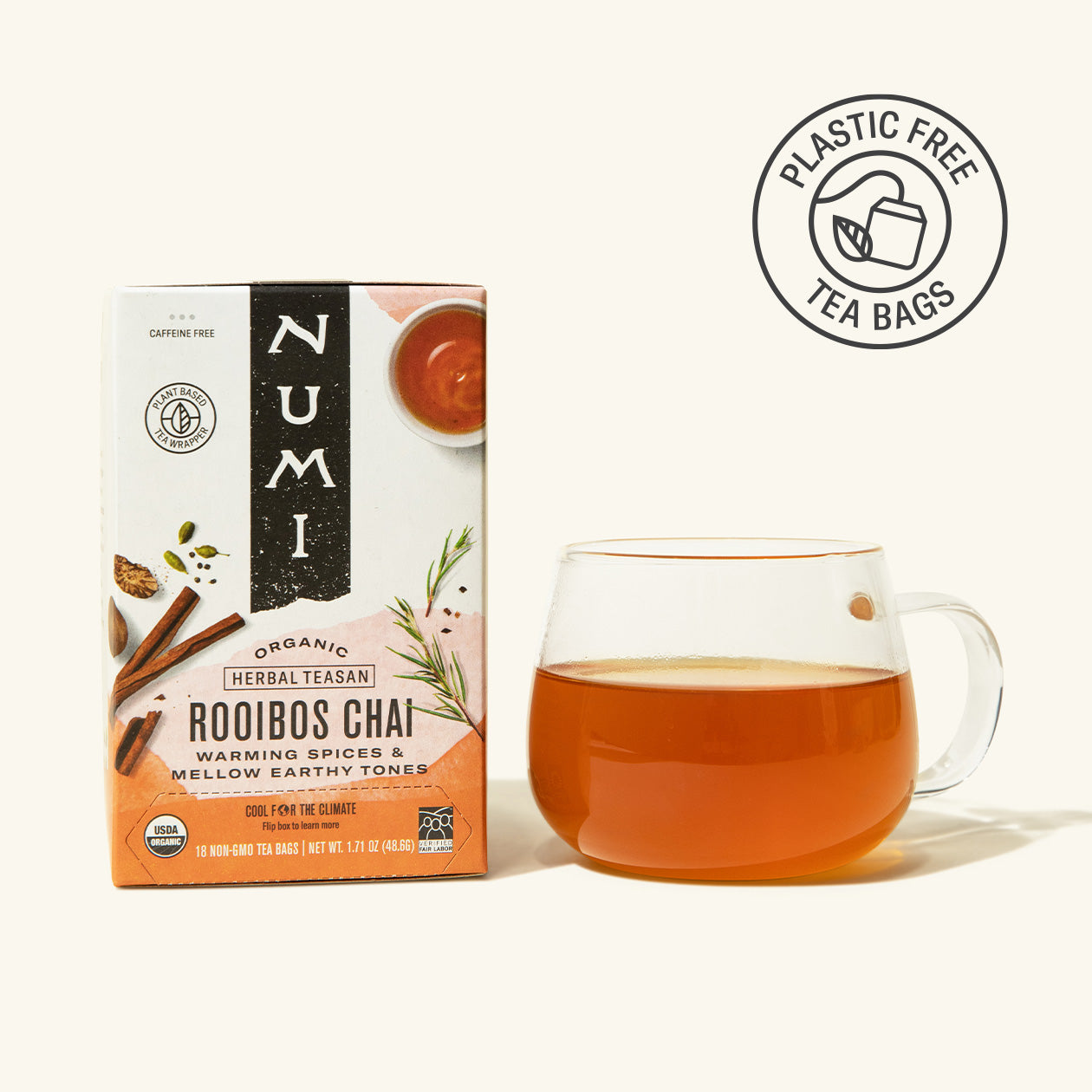 Numi Rooibos Chai tea box with a cup of tea on a white background