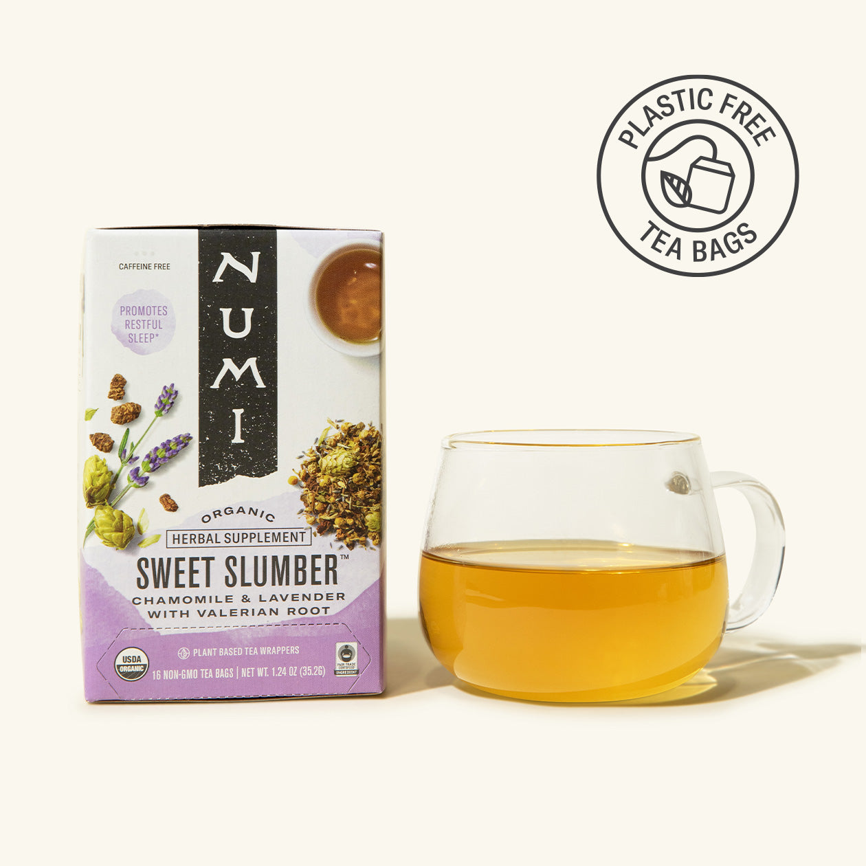 Numi Sweet Slumber tea box with a glass of tea on a white background