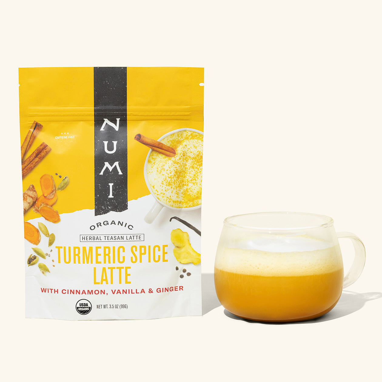 Numi Turmeric Spice Latte package with a cup of latte on a white background