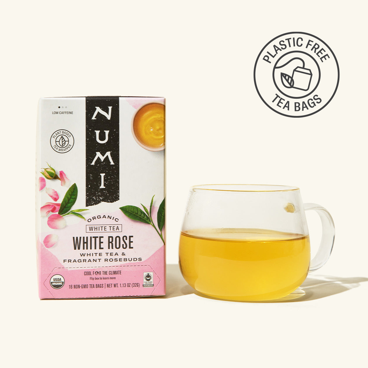 Numi White Rose tea box with a glass of tea on a white background